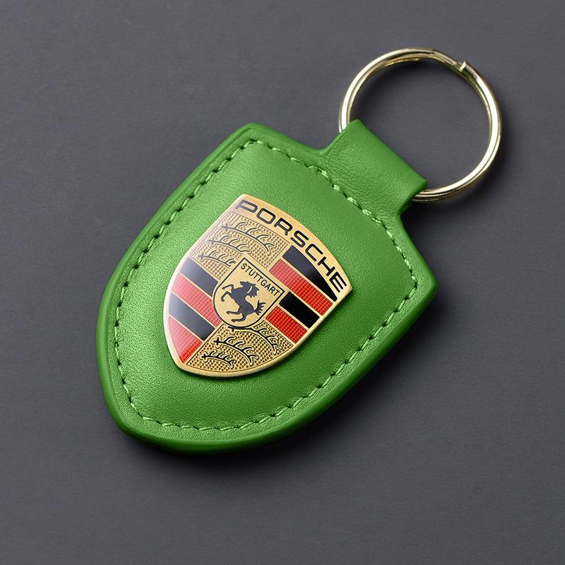 PU-Leder Auto-Schild Schlüsselanhänger Styling Schlüsselanhänger Anhänger für Porsche Cayenne Panamera Macan 911 Taycan Boxster Cayman 918 Pajun