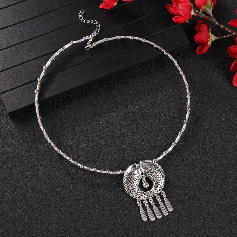 Vintage tassel collar hollow flower seedling silver pendant necklace niche personality collarbone chain women