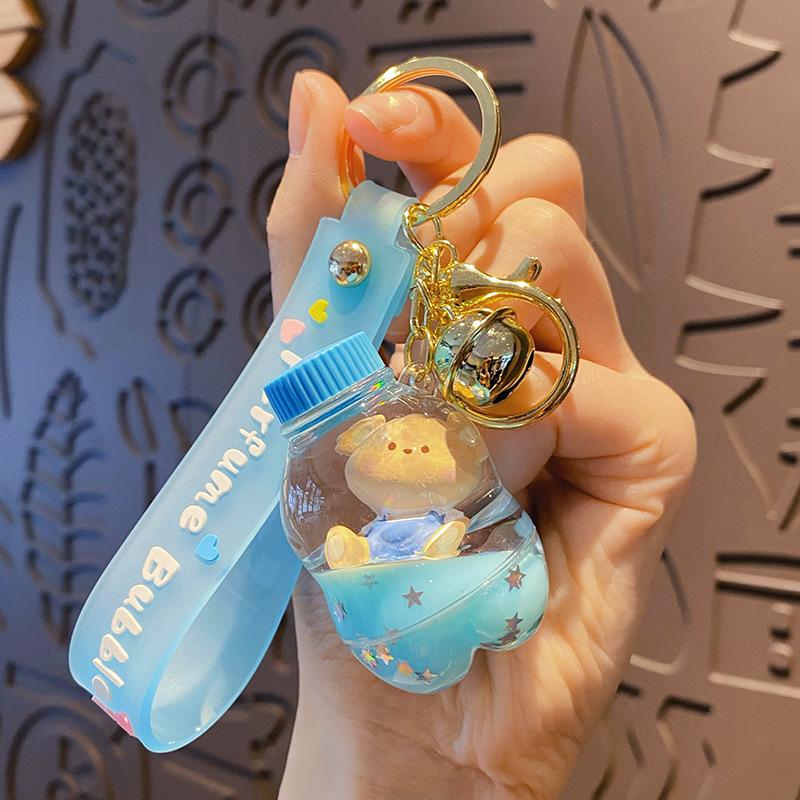 Cartoon oil floating liquid quicksand bottle pearl milk tea bear key chain cute trendy car key chain pendant Key Ring