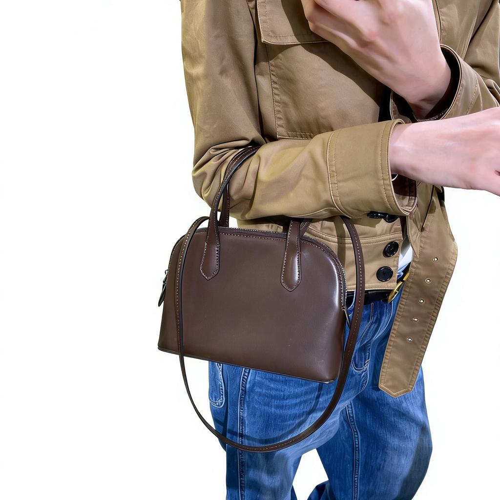 Niche first-layer cowhide minimalist 2026 new spring and summer shell bag single shoulder crossbody portable commuter bowling bag