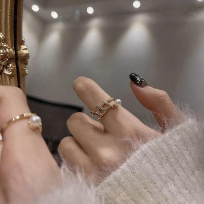 Trendiger Zirkon-Perlen-Kreuzgitterring für Damen – Elegant, auffällig und vielseitig kombinierbares Accessoire für den Zeigefinger.
