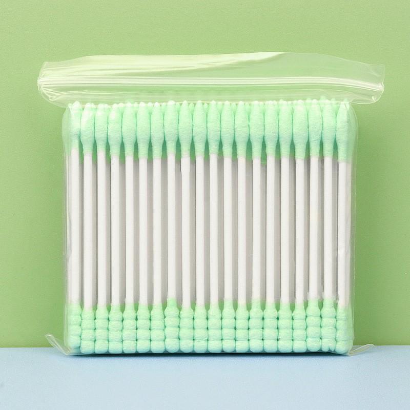 Pack of 100 double-ended, disposable cotton swabs with paper sticks for ear cleaning and makeup application.