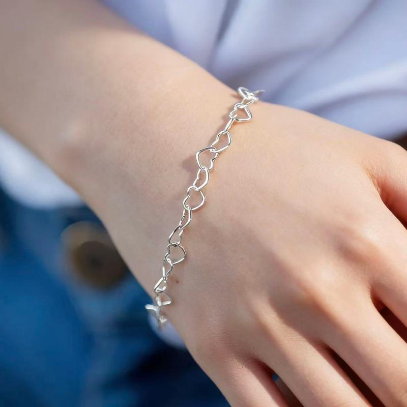 Elegant Hollow Heart Bracelet: Versatile, Stackable Hand Jewelry for Women