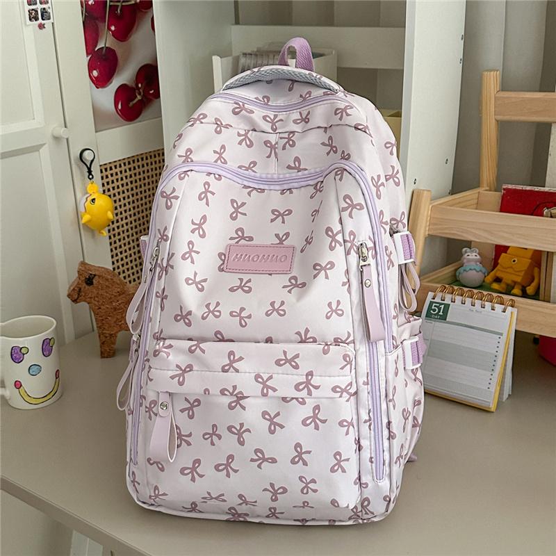 Cute Bow Print Backpack for Women Lightweight Casual Daypack Travel School Bag with Multi Pockets