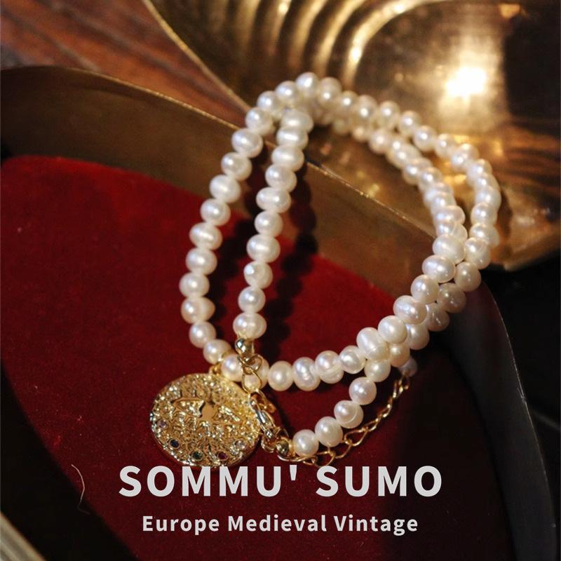 

Natural freshwater millet bead necklace women s new devil s eye pendant pearl collarbone chain