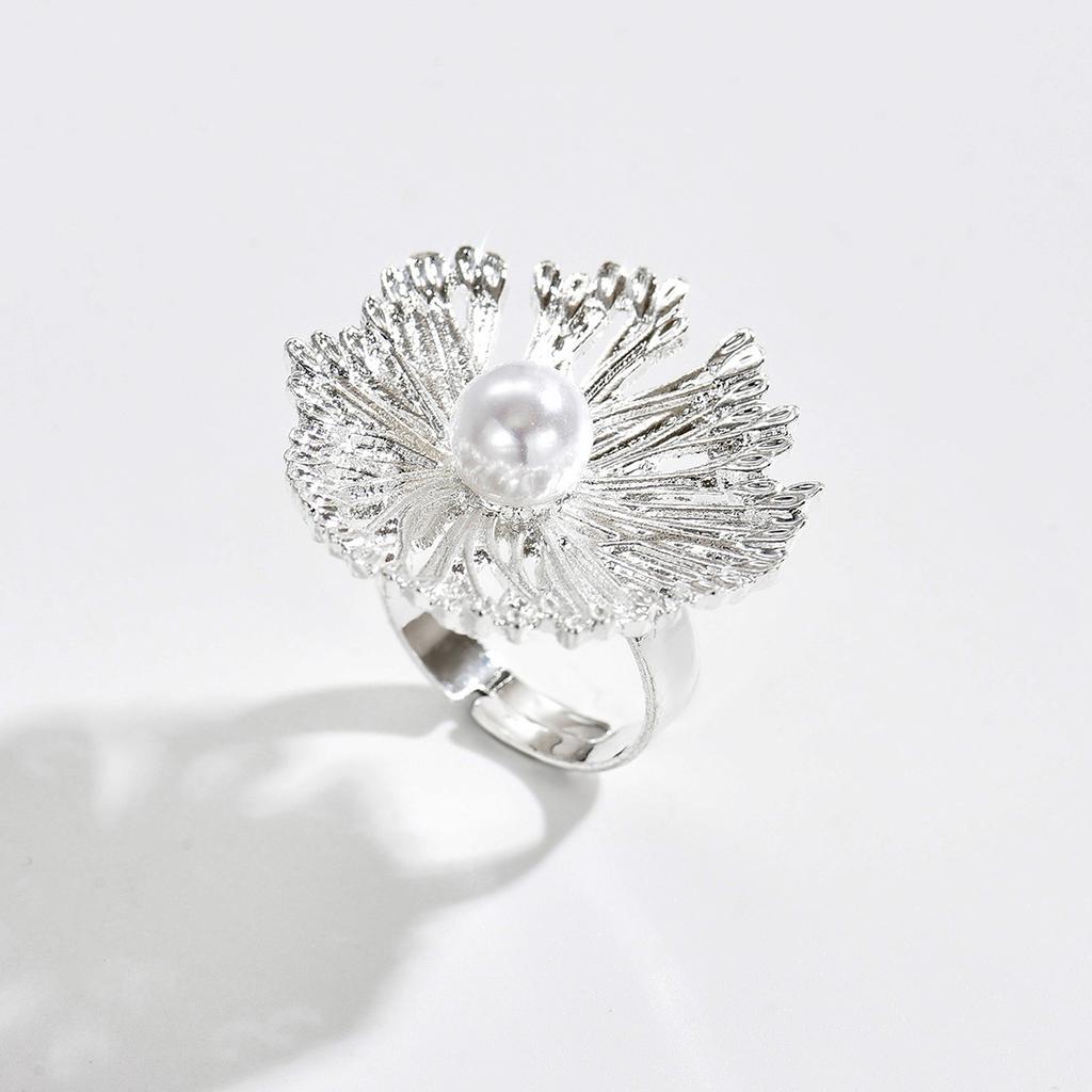 Hollow flower ring European and American niche design sense irregular spiral imitation pearl open ring jewelry women