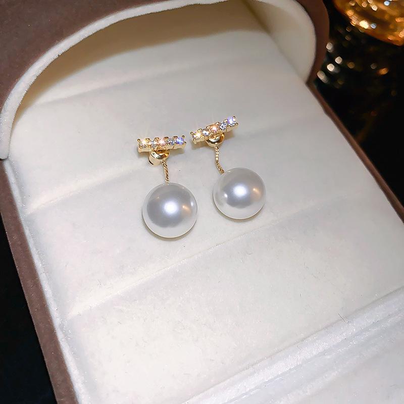 Silver needle zircon butterfly pearl earrings niche design light luxury stud earrings French high-end retro earrings wholesale