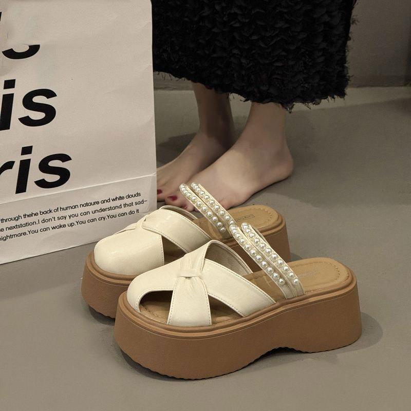 

Баотоу полутапочки женские 2025 новые летние жемчужные два способа носки толстая подошва с чувством дизайна полые с одним педалем ленивые полуподносы 40