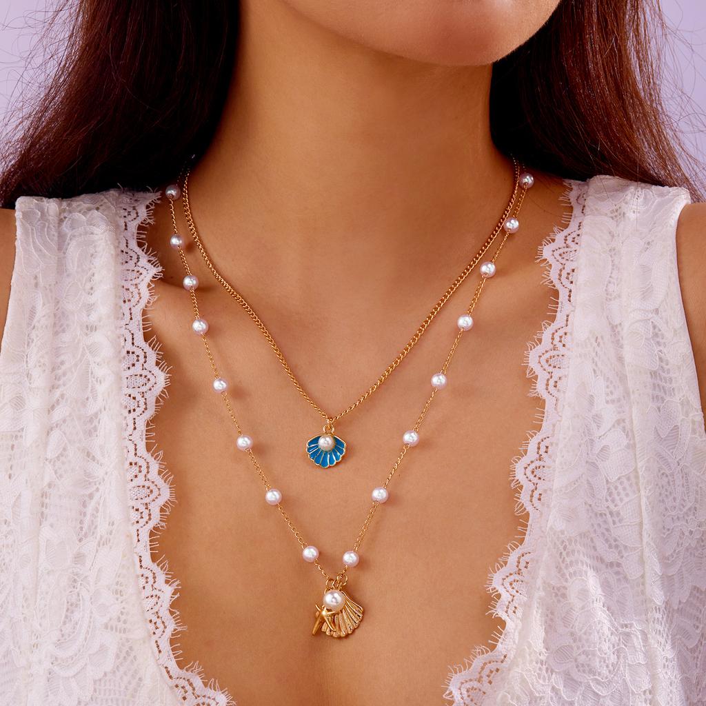 Vintage doppellagige Reiskörner Halskette für Damen Boho Strand Schildkröte Seestern Anhänger Kurzer Choker Halskette Schmuck Zubehör