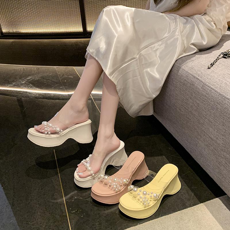 2025 summer new one-word strap transparent sexy high-heeled slippers women's waterproof table pearl slope heel cool slippers