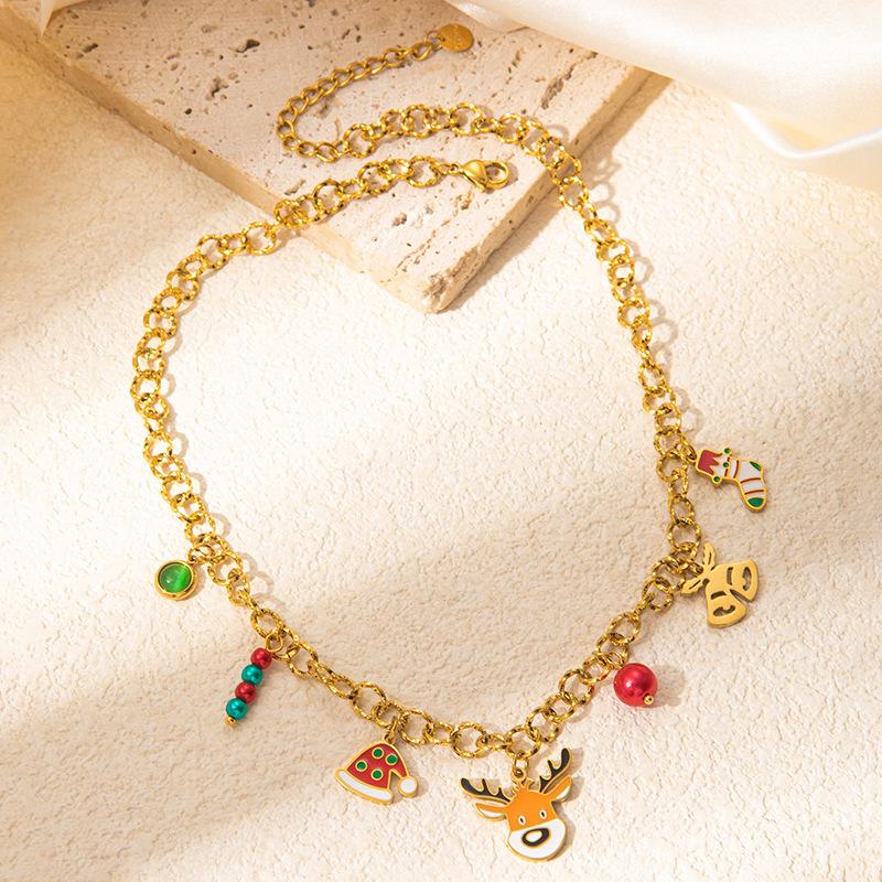 Set de Joyería Navideña de Alta Gama: Collar con Colgante de Reno en Trineo, Pulsera de Árbol de Navidad y Pendientes de Acero de Titanio para Mujer