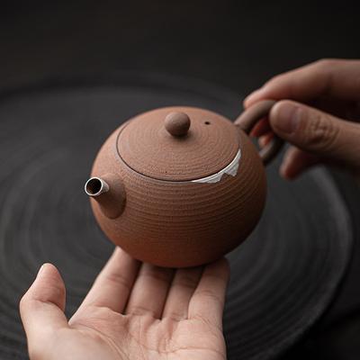 Old Rock Mud Small Round Teapot Family Kung Fu Tea Set Retro Gilded Silver Tea Pot Ball Hole Filtration