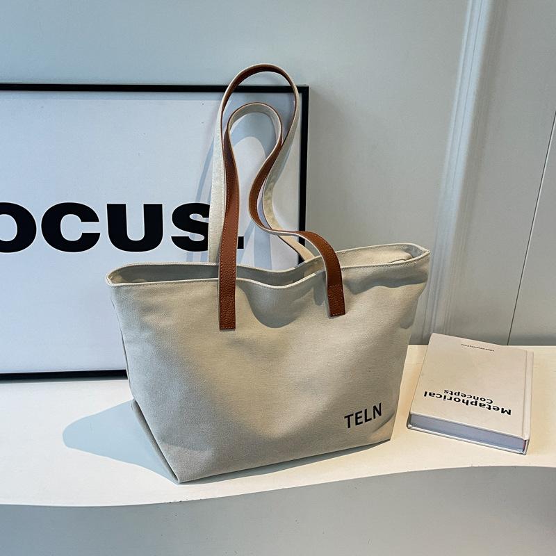 Retro large-capacity canvas tote bag women's bag 2025 new ins casual simple commuter shoulder bag underarm bag