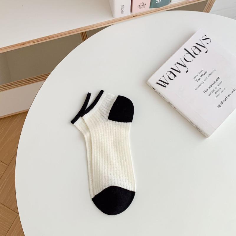A Woman Wearing Summer Mesh Black and White Simple Embroidered Lettering Ultra-thin and Breathable Short Socks