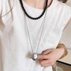 Waterdrop Pendant Titanium Steel Necklace for Women - Elegant and Exclusive Accessory for Light Luxury Fashion, Long Sweater Chain