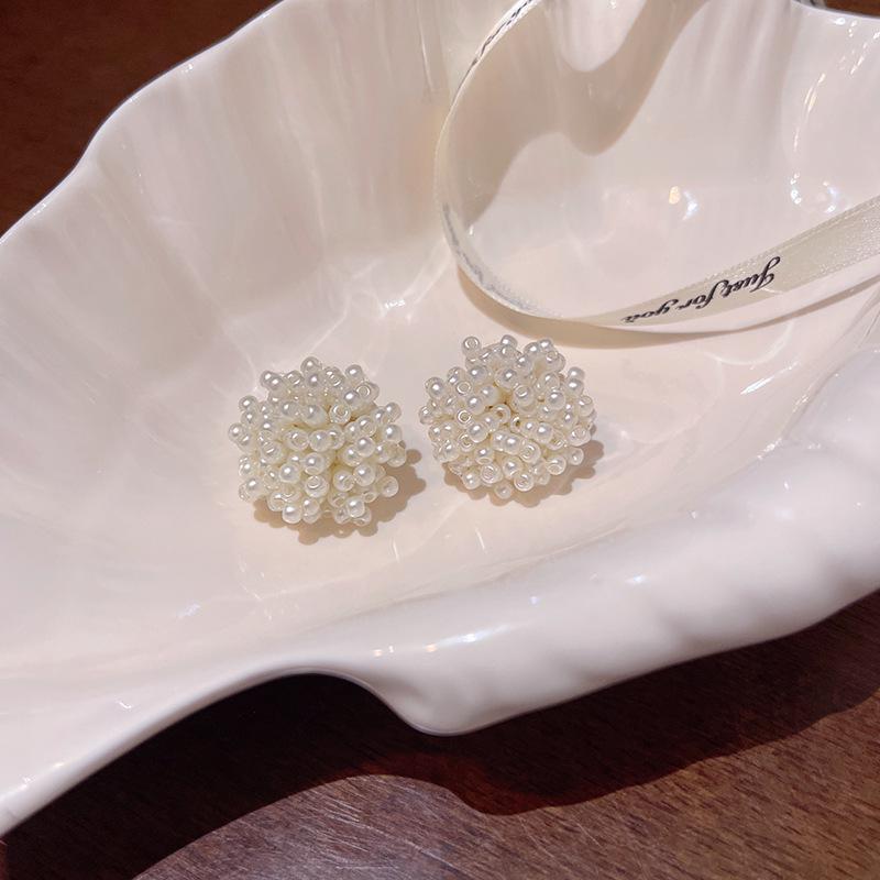 

Элегантные серьги-фейерверки с жемчужными цветами — универсальная роскошь для женщин