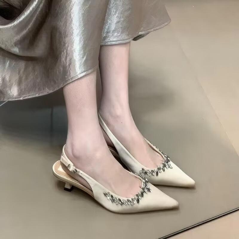 Tide brand new spring and summer nude pointed rhinestone high-heeled sandals women's rear air shallow mouth bag head single shoes niche