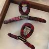 2024 High-End Women's Christmas Red Plaid Claw Clip – Gold Label Winter Hair Accessory