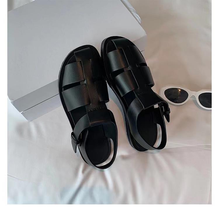 Sheepskin version~ thick-soled woven sandals women's summer one-word buckle belt hollow breathable pig cage shoes flat Roman shoes