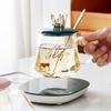 Taza de vidrio simple de vidrio con tapa cuchara oficina hombres y mujeres pareja taza de agua taza de café