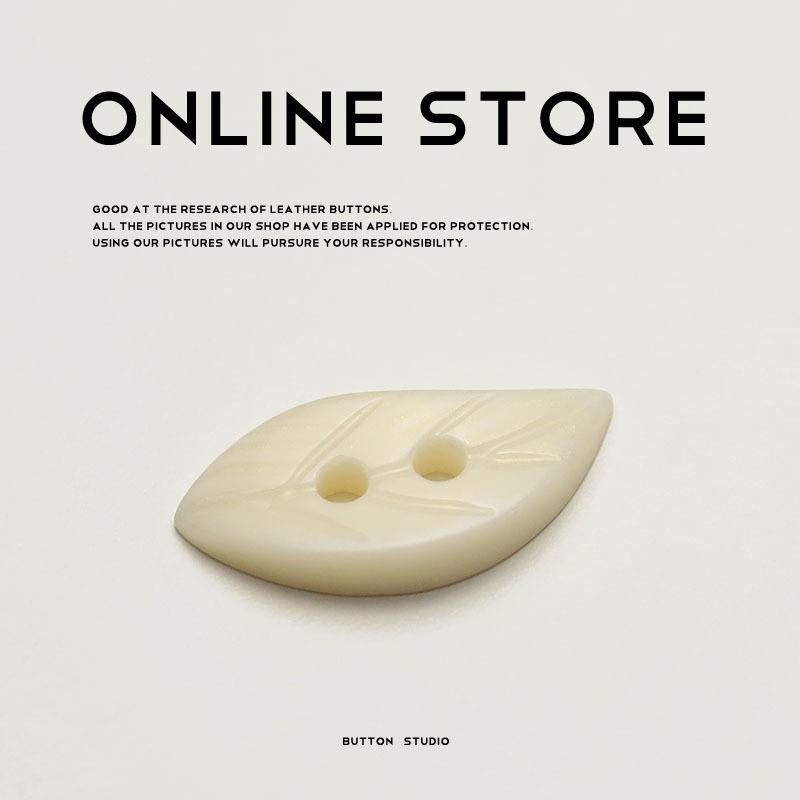 

5pcs Two-eye special-shaped resin button, leaf-shaped clothing decorative button, simple tweed coat, coat button. 1 #[23x10.5mm LY895 #Two-eye leaf beige]