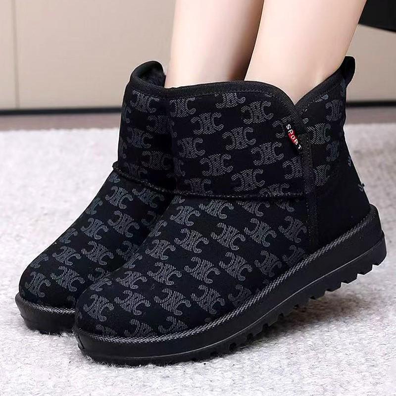 Snöstövlar dam vinter 2025 nya kort skaft staplade förtjockade brödskor fashionabla mångsidiga vattentäta och halkfria bomullsskor