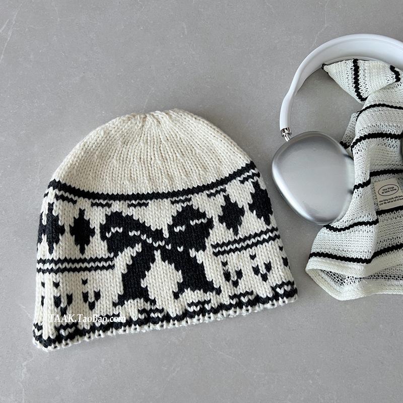 

Korean Autumn and Winter New Retro Jacquard Bow Baotou Woolen Hat Women s Warm Ear Protection Knitted Cold Hat One size