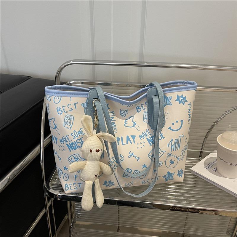 Printed fashion commuting large capacity new personalized pendant autumn popular casual shoulder tote bag