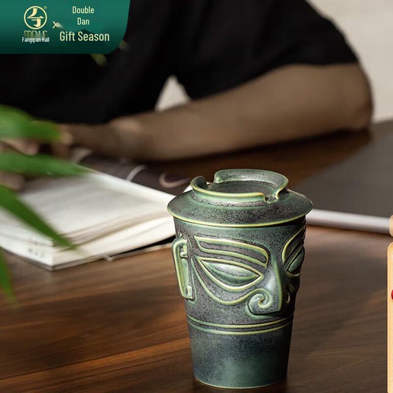 

Edenus Sanxingdui Co-branded Ceramic Teacup - Green Spotted Glaze