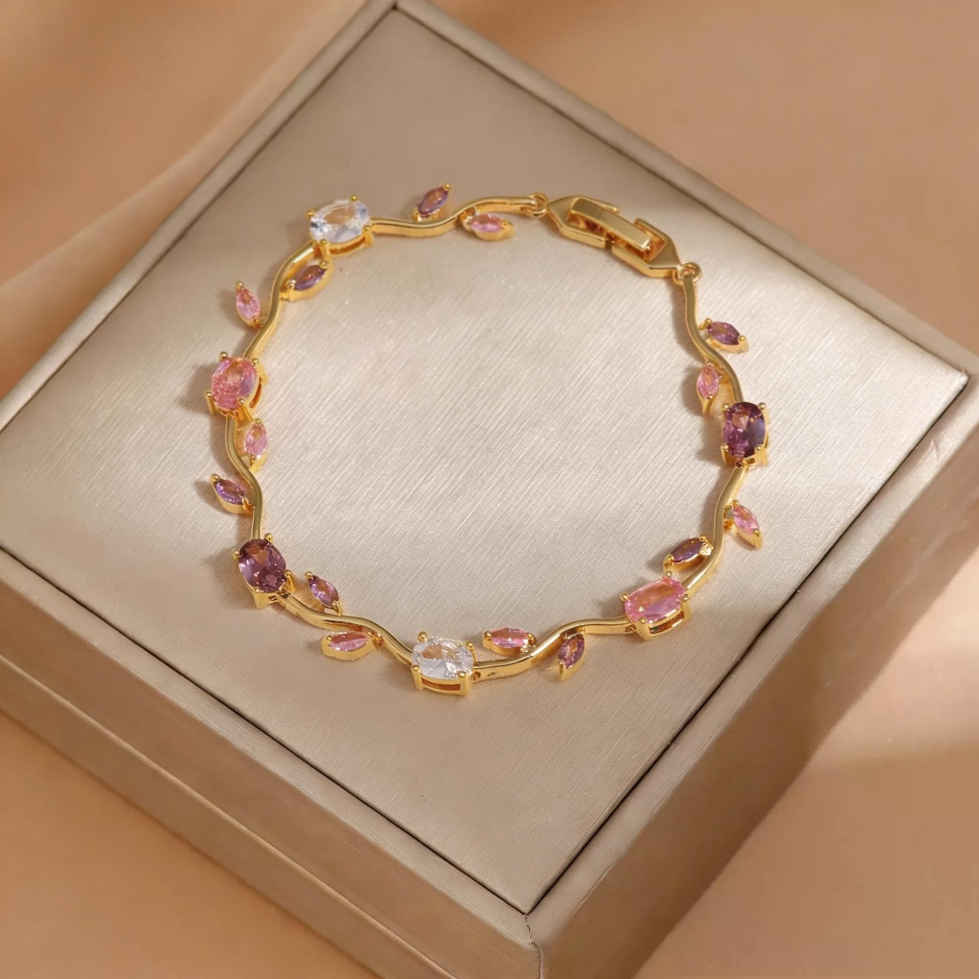 Stainless steel K-gold plated bracelet with tulip design and micro-inlaid zircon branches, perfect jewelry gift for women