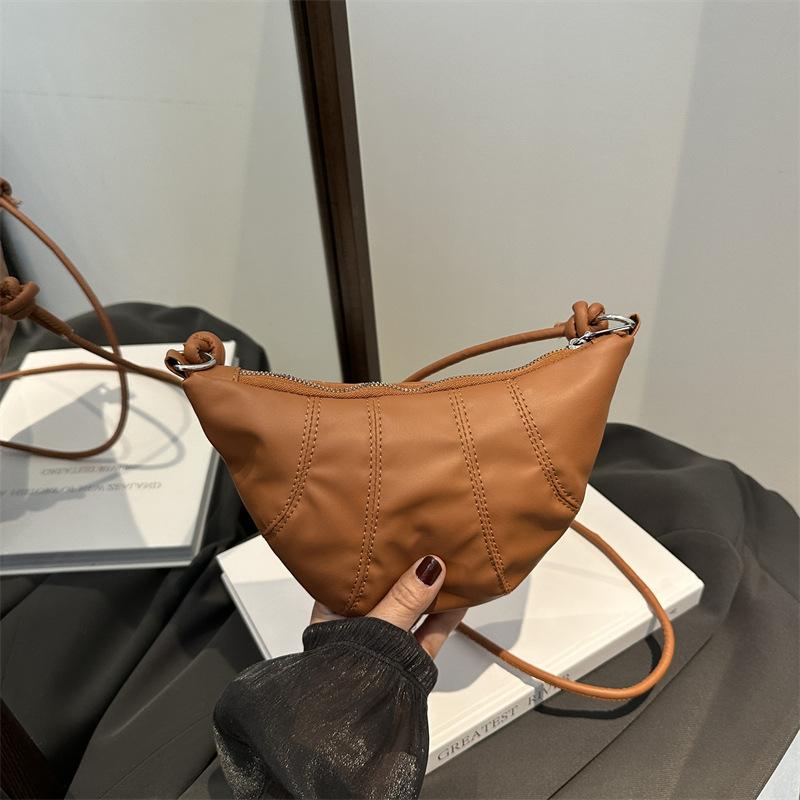 2025 autumn new solid color splicing dumpling bag retro fashion foreign style casual shoulder crossbody armpit bag