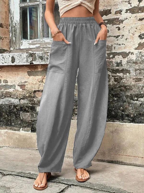 Women's Solid Color Casual Pants with Pockets and Elastic Waist.