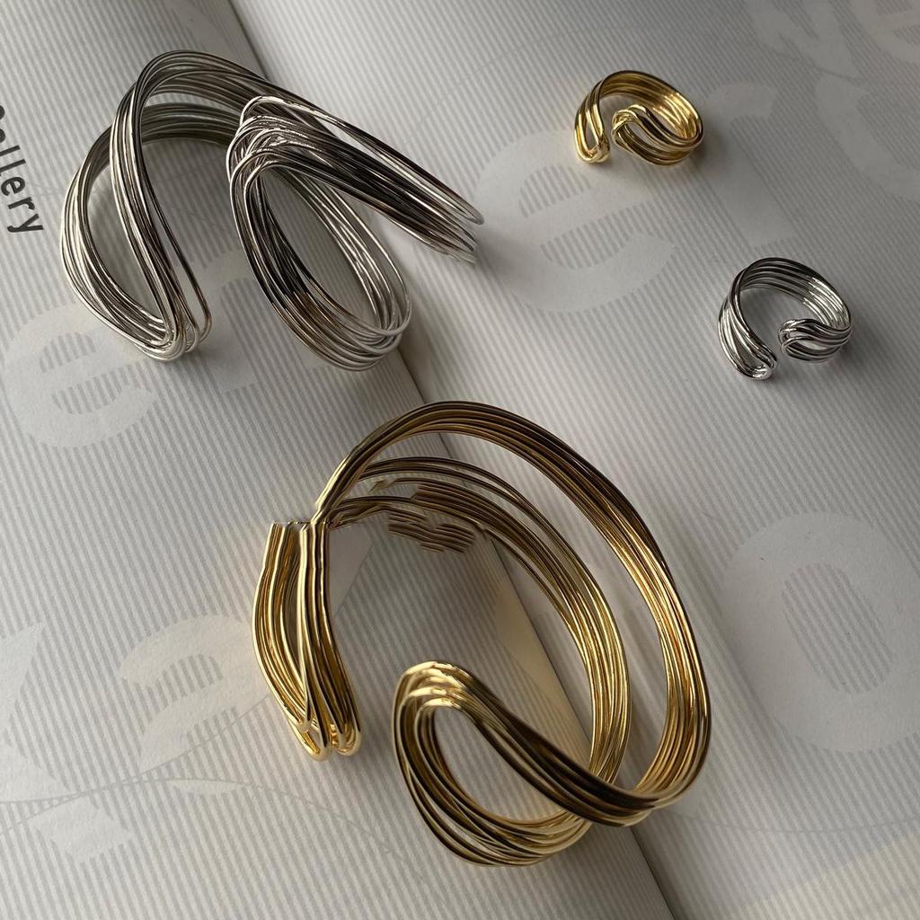 High-End European & American Metal Twist Open Bangle: Fashionable Cold Style Bracelet with Unique Personality