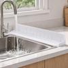 Scissor-Adjustable Sink Water Barrier for Single or Double Bowls with Ribbed Panel, Flexible Form and Return Flows Slope