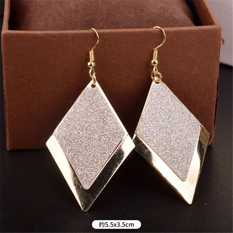 Fashion exaggerated niche temperament fringed earrings retro personality versatile sequined earrings women's long ear jewelry