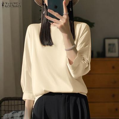 Blusa da donna casual a maniche 3/4 e girocollo a tinta unita