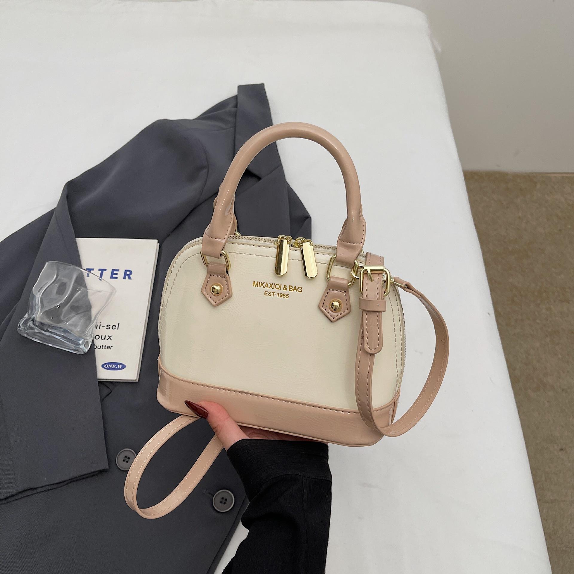 

Оптовая нишевая дизайнерская наплечная сумка-мессенджер 2025 новый модный дизайн текстурная женская портативная сумка-ракушка