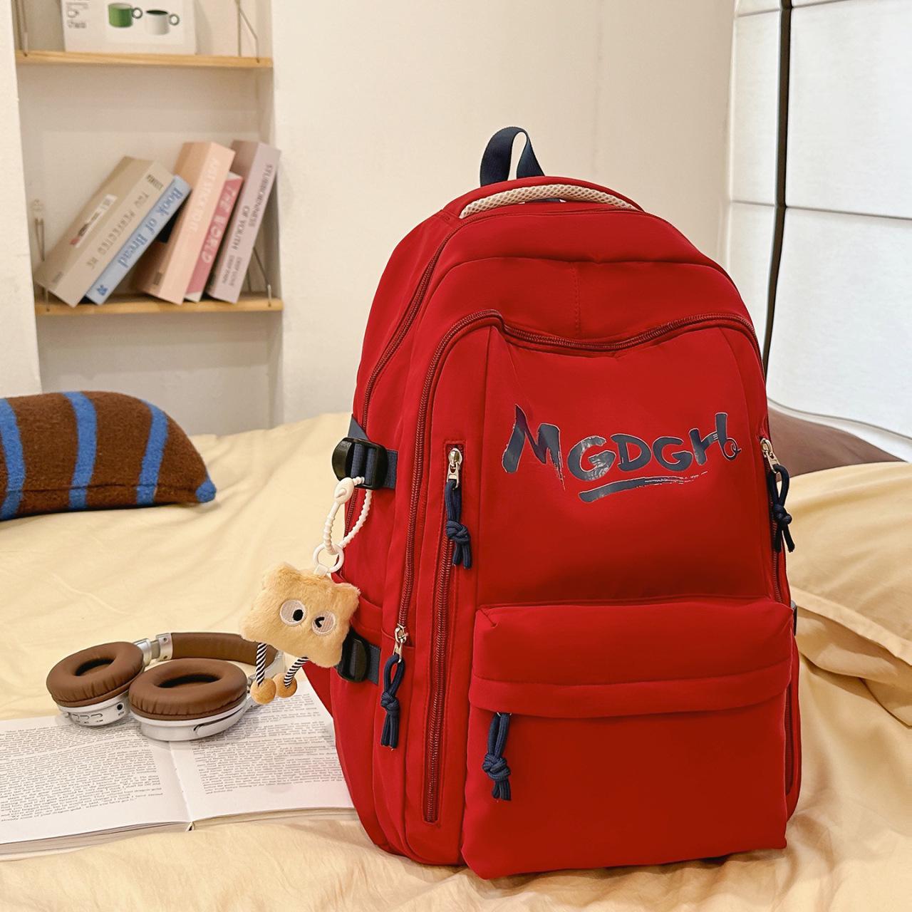 

Korean Style Versatile Student Backpack - Large Capacity, Lightweight, Casual Travel Bag for Couples Backpack Only червоний
