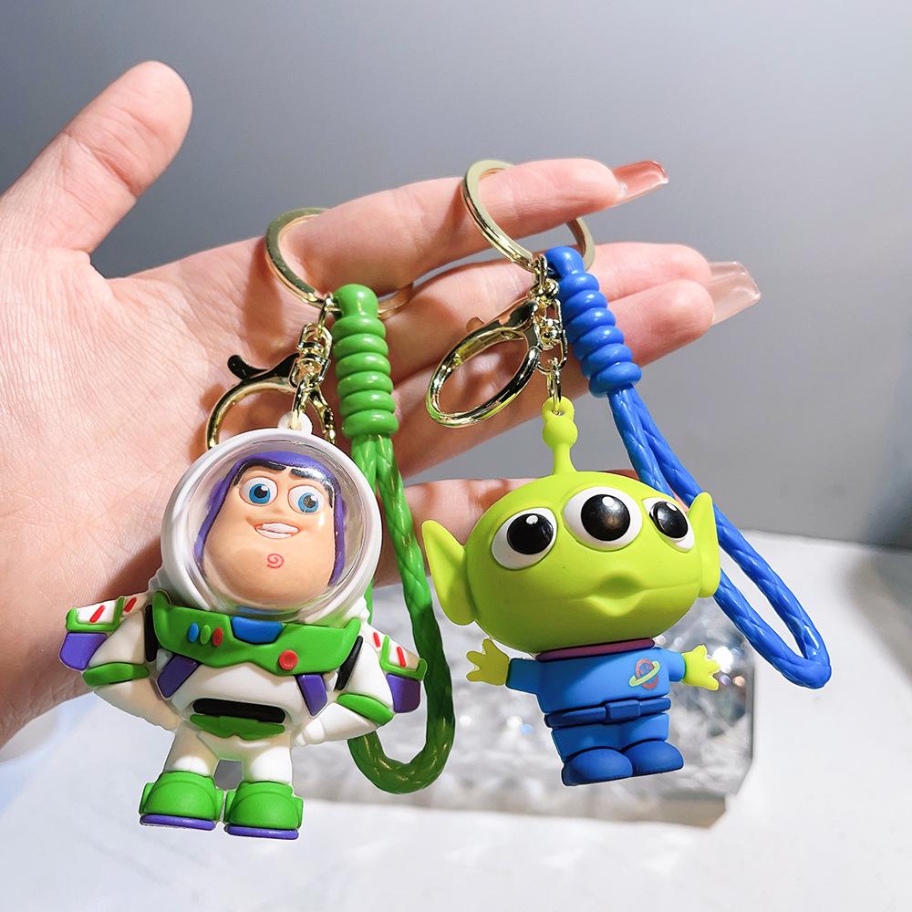 Best-Selling Toy Story Figures Keychain: Three-Eyed Alien, Buzz Lightyear, and Strawberry Bear Charms