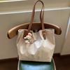 2024 Korean version of large-capacity nylon cloth bag, simple and lightweight tote bag, women's casual commuter underarm shoulder bag.