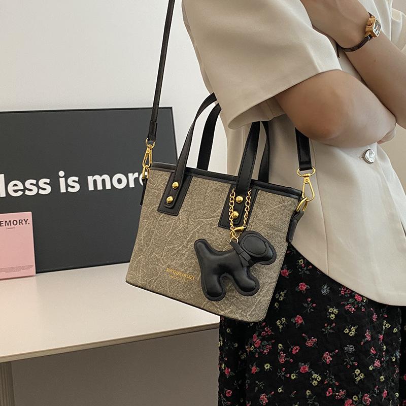 Simple Handbag Bag Women's High-end Sense Versatile Single Shoulder Oblique Span Bag Niche Design Commuter Bucket Bag