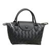 2025 New Women's Bag Niche Design Spring Summer Korean Version Versatile Fashion Cowhide Woven Women's Handbag Single Shoulder Small Dumpling Bag