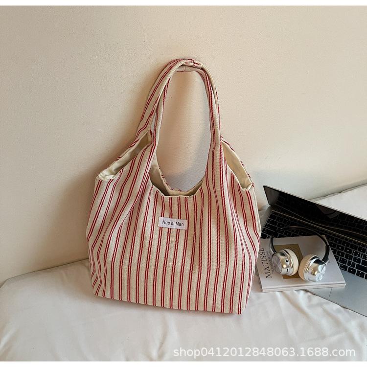 Canvas bag large capacity tote bag women's 2025 new summer niche stripes simple fashion portable shoulder bag