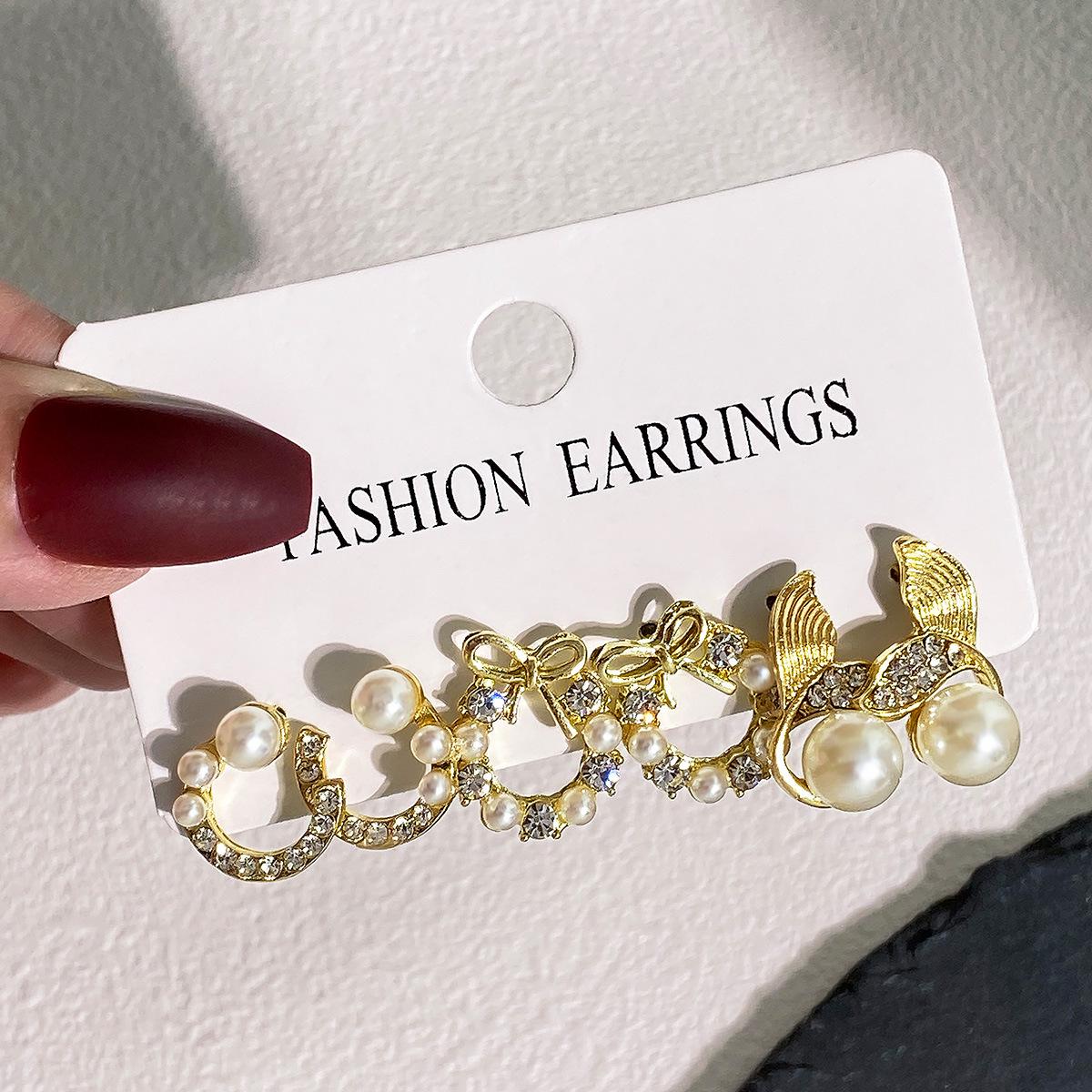 

Элегантные серьги «рыбий хвост» с жемчужной луной и бриллиантовой инкрустацией – модная коллекция Temperament из 3 предметов Alloy