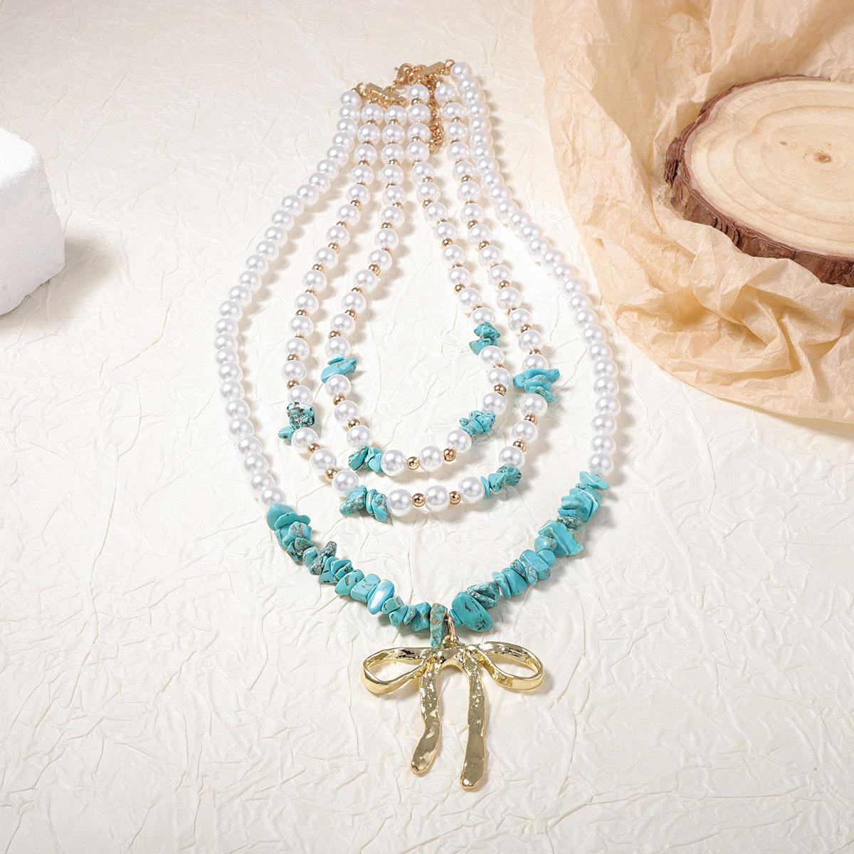 

Personalized trend handmade beads multi-layer stacking alloy bow pendant necklace versatile niche design sense