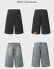 Herren-Jeansshorts im amerikanischen Retro-Waschungsstil – locker, lässig, High-Street-Stil, umgekehrt zu tragen, Sieben-Punkt-Design.