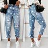 Jeans skinny strappati lavati stampati per donna