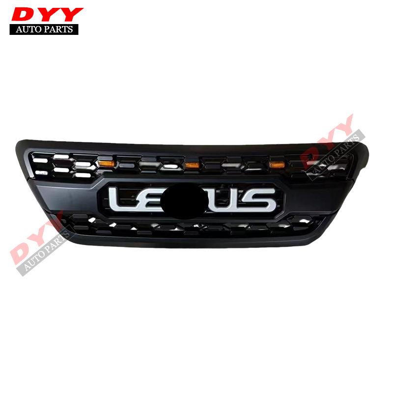 Fits 2003-2009 Lexus GX470: Black grille with integrated lights and amber accents.