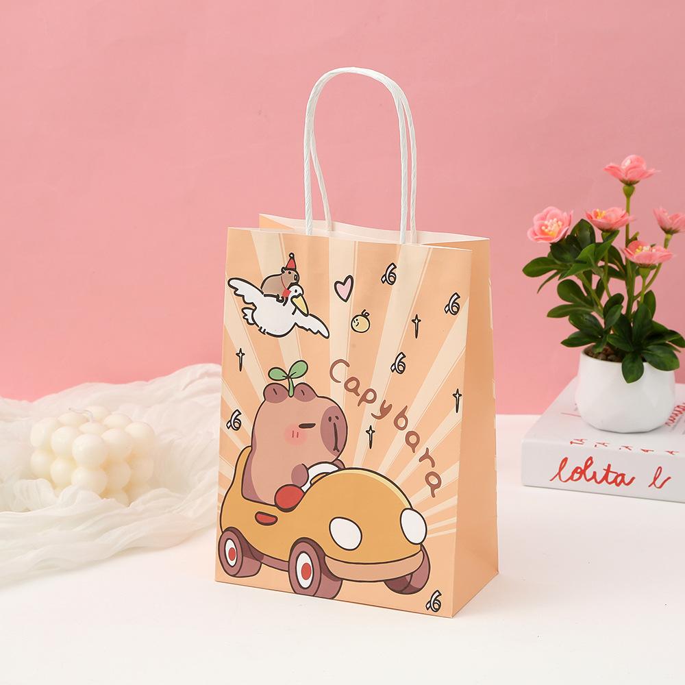 StoBag Capybara Cartoon Kraft Gift Wrapping Bags for Sweets Reusable Cute Kids Birthday Party Favor Tote Animal Theme Packaging