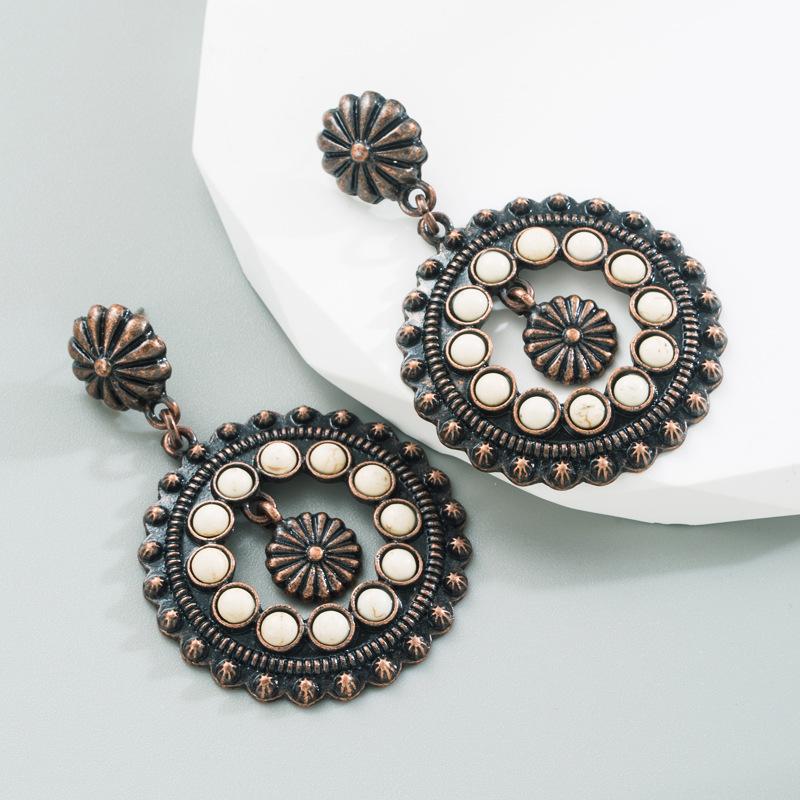 Retro Ethnic Style Earrings with Hollow Round Pendants and Exaggerated Party-style Ear Accessories